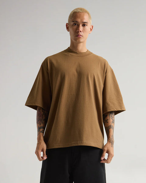 Model in a latte oversized boxy tee
